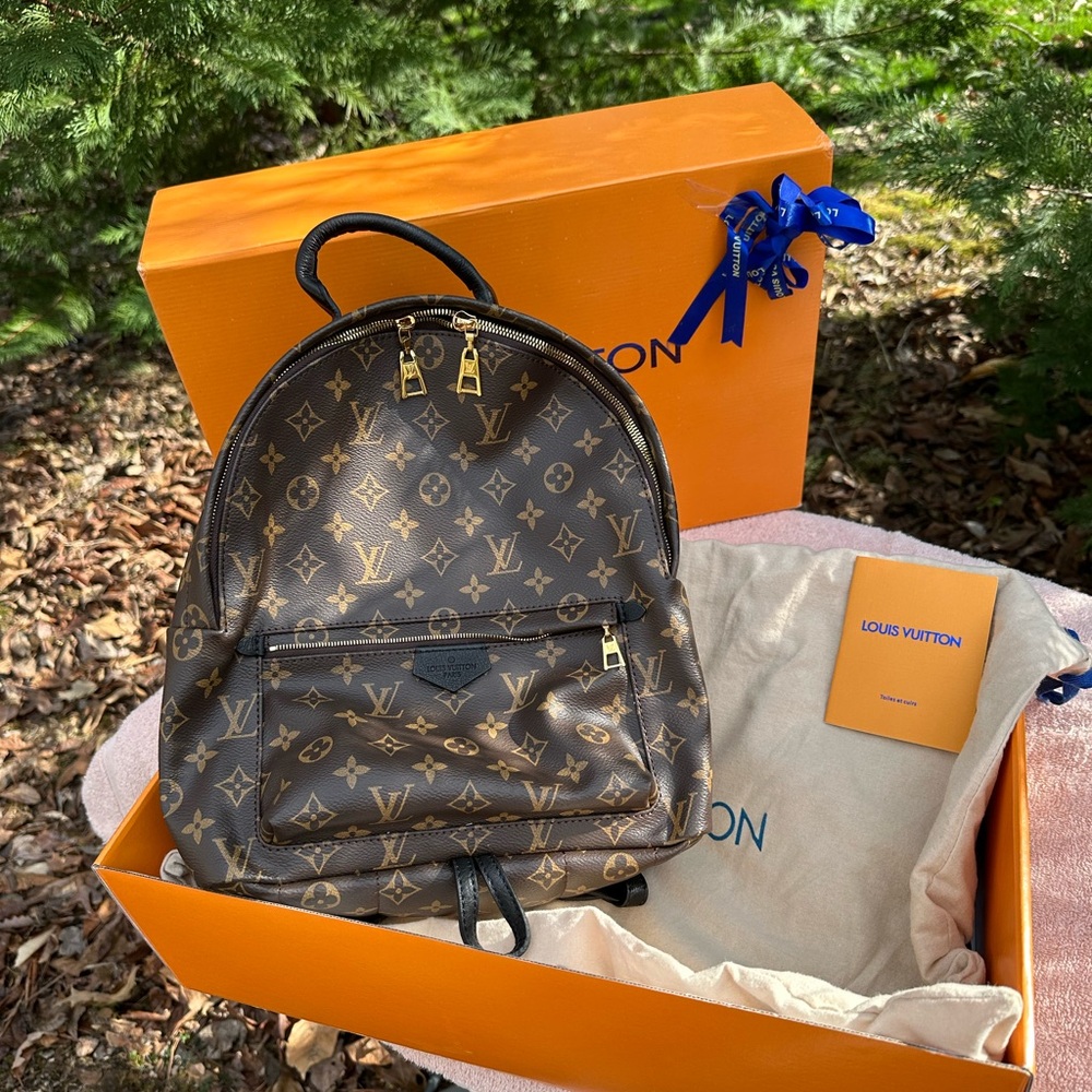 Louis Vuitton Brown  Monogram Backpack with Gold Accents and more!